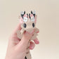 A flower-themed Floralyn Dragon with intricate details and flexible features, ideal for fidgeting and display.